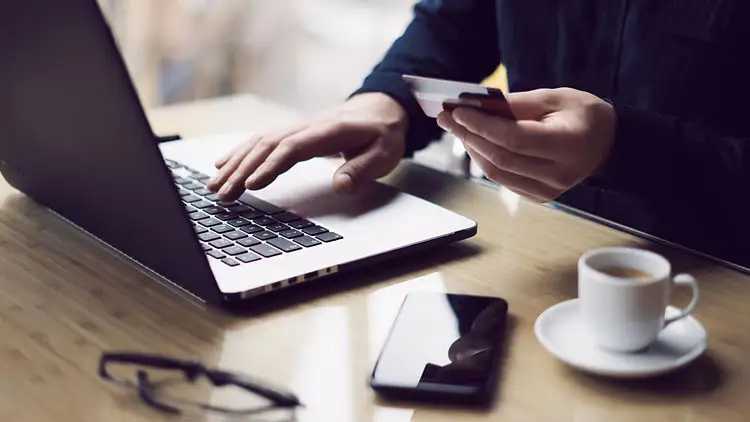 Employee using a purchasing card to pay for a business expense